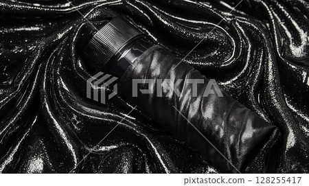 intriguing black IV bag rests on shimmering, dark surface, holding inky liquid exudes aura of mystery and allure, representing passion and forbidden love 128255417