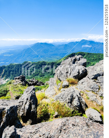 Climbing Mt. Myoko in summer (view of Mt. Kurohime and Mt. Takatsuma from the summit of the southern peak) Climbing Mt. Myoko in summer (view of Mt. Kurohime and Mt. Takatsuma from the summit of the southern peak) 128255918