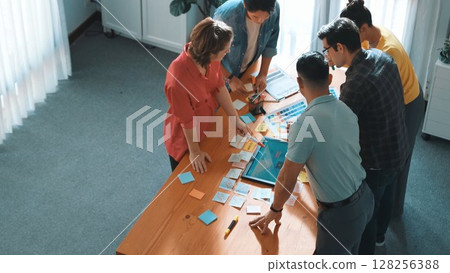 Time lapse of manager writing idea on sticky notes and explain idea. Symposium. 128256388