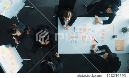 Top view of team present project and turn around to clap hands. Directorate. 128256393