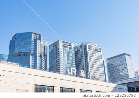 JR Shinagawa Station (Takanawa Exit) and the surrounding office buildings on a clear day in Minato Ward, Tokyo JR Shinagawa Station (Takanawa Exit) and the surrounding office buildings on a clear day in Minato Ward, Tokyo 128256788
