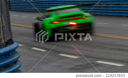 Motion blur race car racing on speed track, Motion blurred super car race on street track circuit, Automobile automotive transportation vehicle background, Motion blur race car racing on speed track, Motion blurred super car race on street track circuit, Automobile automotive transportation vehicle background, 128257633
