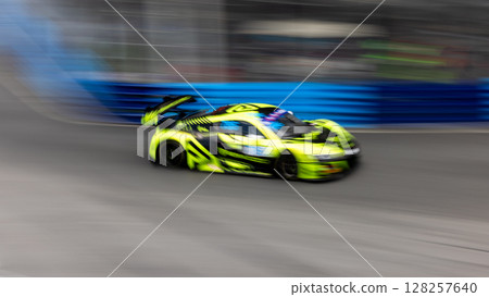 Motion blur race car racing on speed track, Motion blurred super car race on street track circuit, Automobile automotive transportation vehicle background, Motion blur race car racing on speed track, Motion blurred super car race on street track circuit, Automobile automotive transportation vehicle background, 128257640