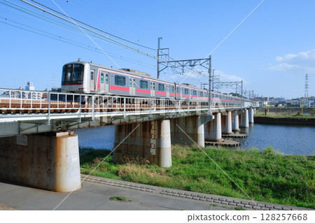 Toyoko Line train crossing the Tsurumi River 128257668