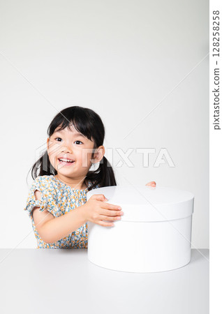 Gift box and child Gift box and child 128258258