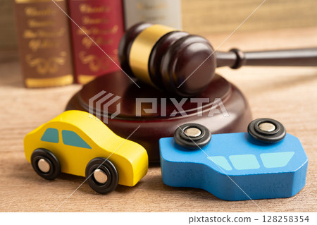 Hammer gavel judge with car vehicle accident, insurance coverage claim lawsuit court case. 128258354