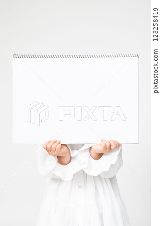 A girl with a sketchbook 128258419