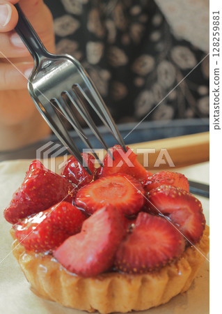 Delicious strawberry tart topped with fresh fruit 128259881