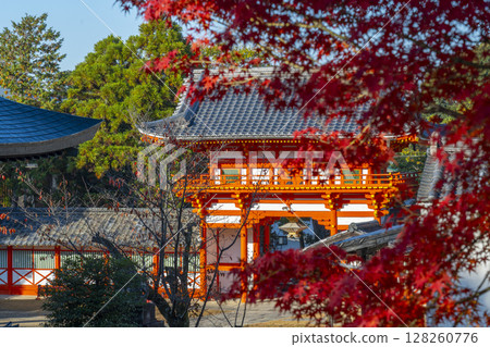 Shin Hiyoshi Shrine: Tower gate seen through the maple leaves Shin Hiyoshi Shrine: Tower gate seen through the maple leaves 128260776