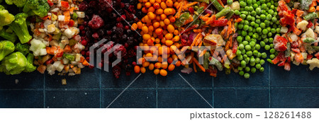 Eye-catching banner with frozen fruits and vegetables, emphasizing the vibrant, seasonal process of freezing healthy produce for winter, ideal for health-related advertisements Eye-catching banner with frozen fruits and vegetables, emphasizing the vibrant, seasonal process of freezing healthy produce for winter, ideal for health-related advertisements 128261488