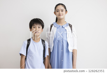 Cute elementary school students lined up Cute elementary school students lined up 128262351