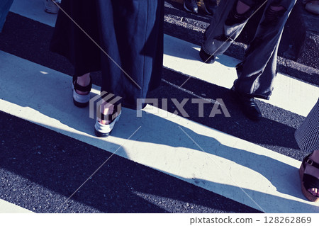 People crossing the street 128262869