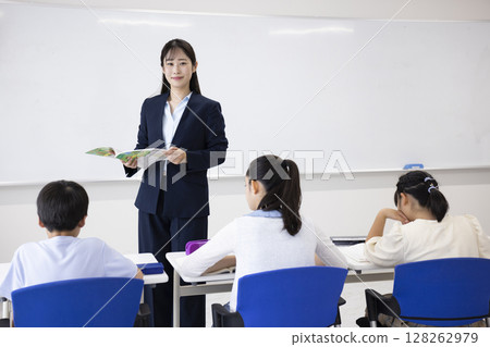 Children and teachers taking lessons Children and teachers taking lessons 128262979