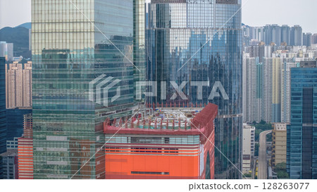 July 6 2025 Modern Urban Skyscraper View Featuring Glass Facades and Vibrant Cityscape 128263077