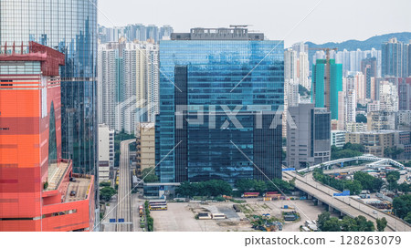 July 6 2025 Modern Urban Skyscraper View Featuring Glass Facades and Vibrant Cityscape 128263079