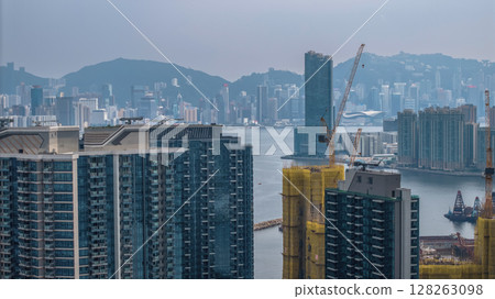 July 6 2025 Modern High-Rise Residential Towers with Urban Waterfront Views 128263098