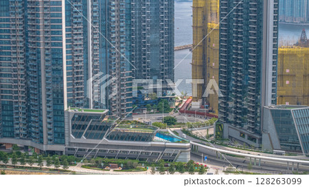 July 6 2025 Modern High-Rise Residential Towers with Urban Waterfront Views July 6 2025 Modern High-Rise Residential Towers with Urban Waterfront Views 128263099