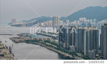 July 6 2025 Modern High-Rise Residential Towers with Urban Waterfront Views 128263101