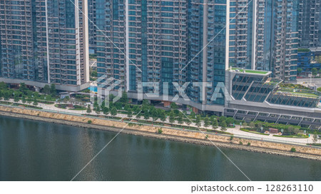 July 6 2025 Modern High-Rise Residential Towers with Urban Waterfront Views 128263110