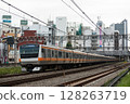 E233 series train on the Chuo Rapid Line running through Ogikubo Station 128263719