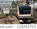 E233 series train on the Chuo Rapid Line running through Ogikubo Station 128263721