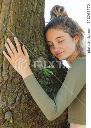 Embracing Nature Taking a Moment to Connect Deeply with a Majestic Tree and its Beauty Embracing Nature Taking a Moment to Connect Deeply with a Majestic Tree and its Beauty 128263770