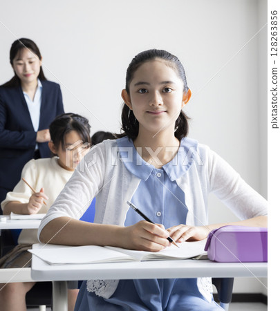 Children and teachers taking lessons 128263856