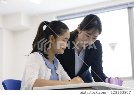 Children and teachers taking lessons 128263867