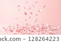 A shower of falling pink petals 128264223