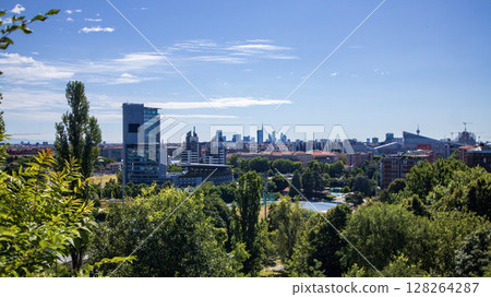 Milan skyline with modern skyscrapers un a sunny day Milan skyline with modern skyscrapers un a sunny day 128264287
