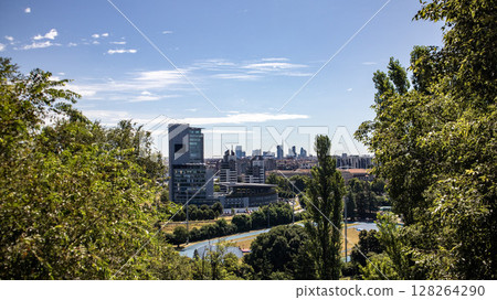 Milan skyline with modern skyscrapers un a sunny day Milan skyline with modern skyscrapers un a sunny day 128264290