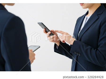 A Japanese woman operating a smartphone (white background, for cutting out) 128264428