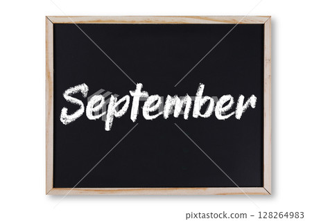 September word in chalk on chalkboard 128264983