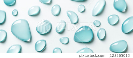Mint Green Liquid Droplets on White Surface 128265013