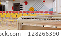 Modern school assembly hall interior with piano 128266390
