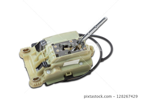Spare part on a white isolated background in a photo studio for sale at an auto-parsing or replacement in a car service center - Automatic transmission selector gear lever with plastic elements. 128267429
