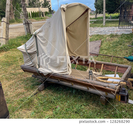 Traditional Wooden Cart with Canopy 128268290