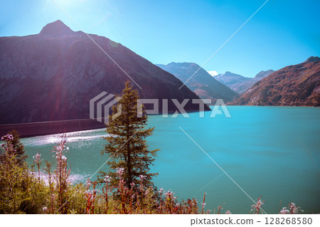 View of a mountain lake Kolnbreinspeicher. Gamskarnock, Austria, Europe View of a mountain lake Kolnbreinspeicher. Gamskarnock, Austria, Europe 128268580