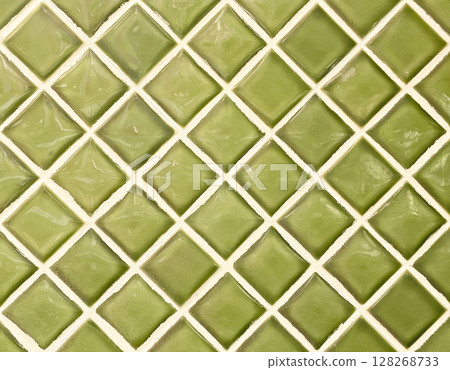 Background image of a wall made of light matcha green square tiles laid diagonally Background image of a wall made of light matcha green square tiles laid diagonally 128268733