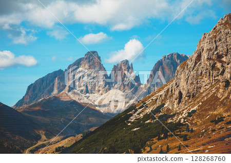 Mountain range against a beautiful cloudy sky 128268760