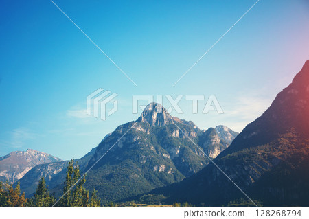 Mountain landscape background. Rocks against the day sky. The dolomites in South Tyrol Italy Europe 128268794
