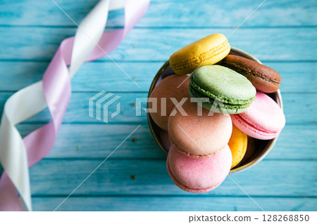 Macaroons and light blue background Macaroons and light blue background 128268850