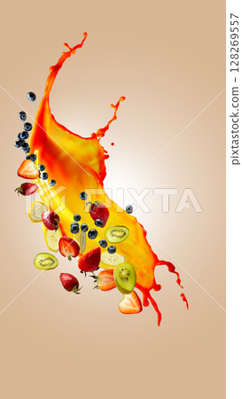 Hand made collage. Fresh fruits and juice splash with strawberries, banana, kiwi, and blueberries Hand made collage. Fresh fruits and juice splash with strawberries, banana, kiwi, and blueberries 128269557
