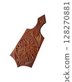 Wooden cutting board for kitchen with geometric patterns on white background 128270881