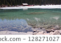 Thawing ice reveals clear lake 128271027