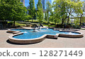 fountain with dolphin sculptures in the city 128271449