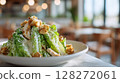 A hearty, tall Caesar salad | Natural lighting 128272061