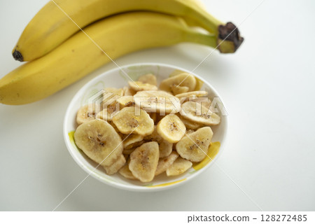 Banana chips and bananas 128272485