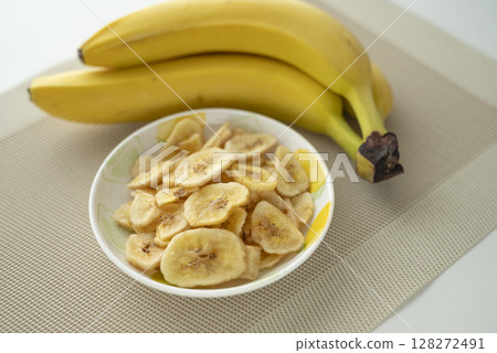 Banana chips and bananas 128272491