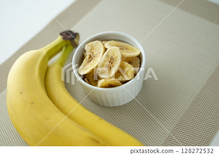 Banana chips and bananas 128272532